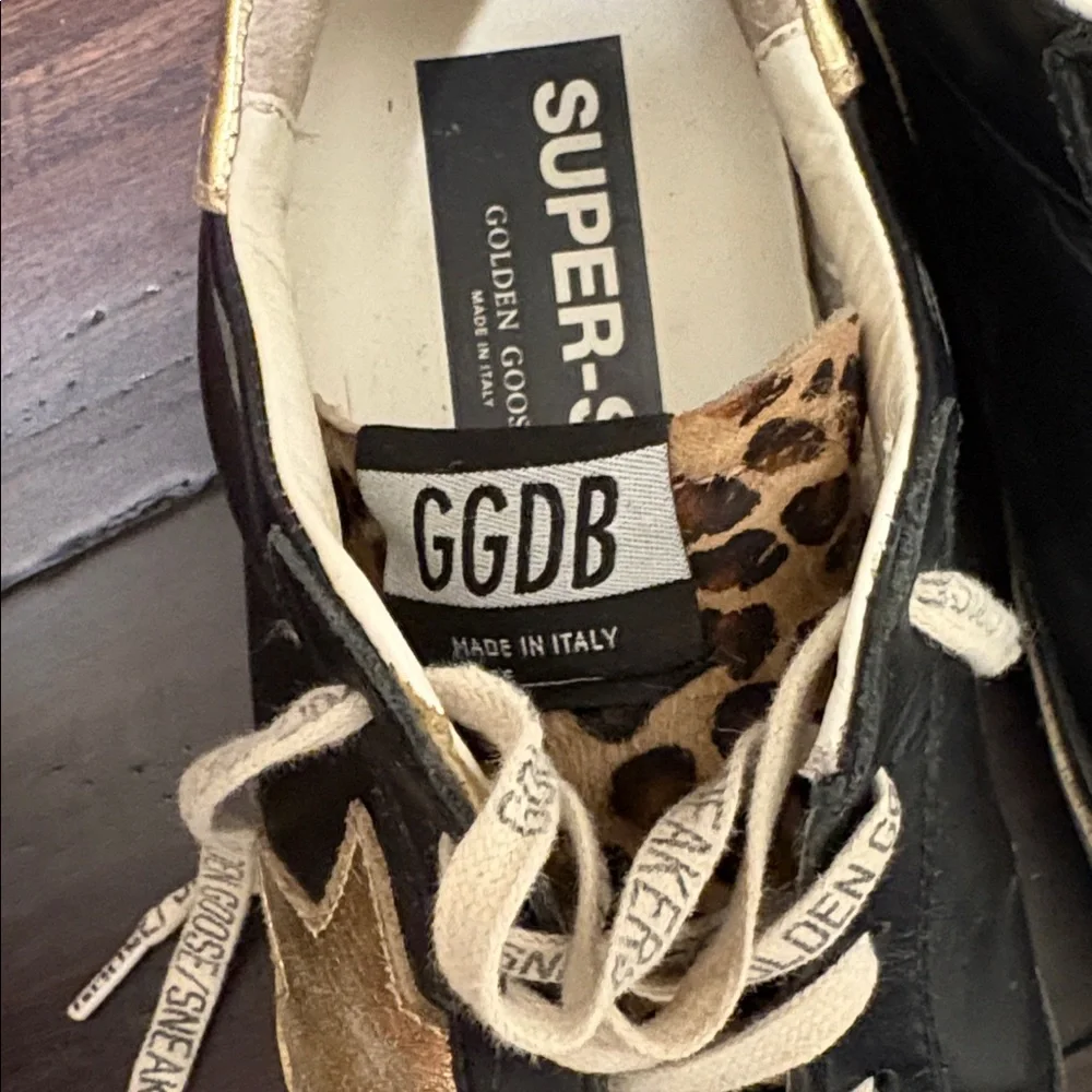 Golden Goose Superstar Black and Gold Sneakers with Leopard Print